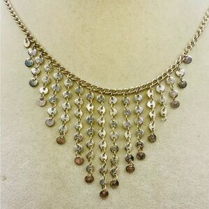 Silver Tone Fringe Necklace with rows of Shimmery Round Discs. 18 inch long